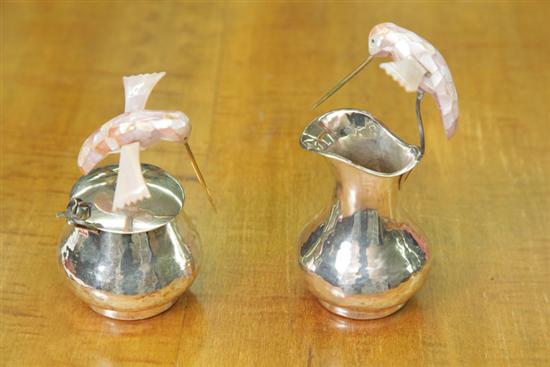 Appraisal: SILVER CREAMER AND SUGAR WITH PINK MOTHER OF PEARL HUMMINGBIRDS