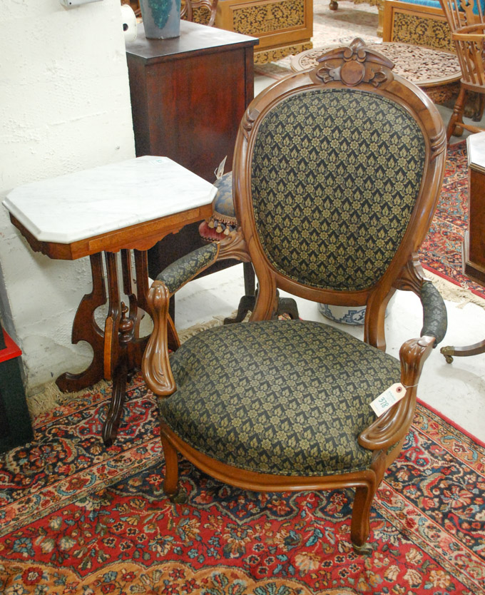 Appraisal: VICTORIAN WALNUT ARMCHAIR AND LAMP TABLE American last quarter of