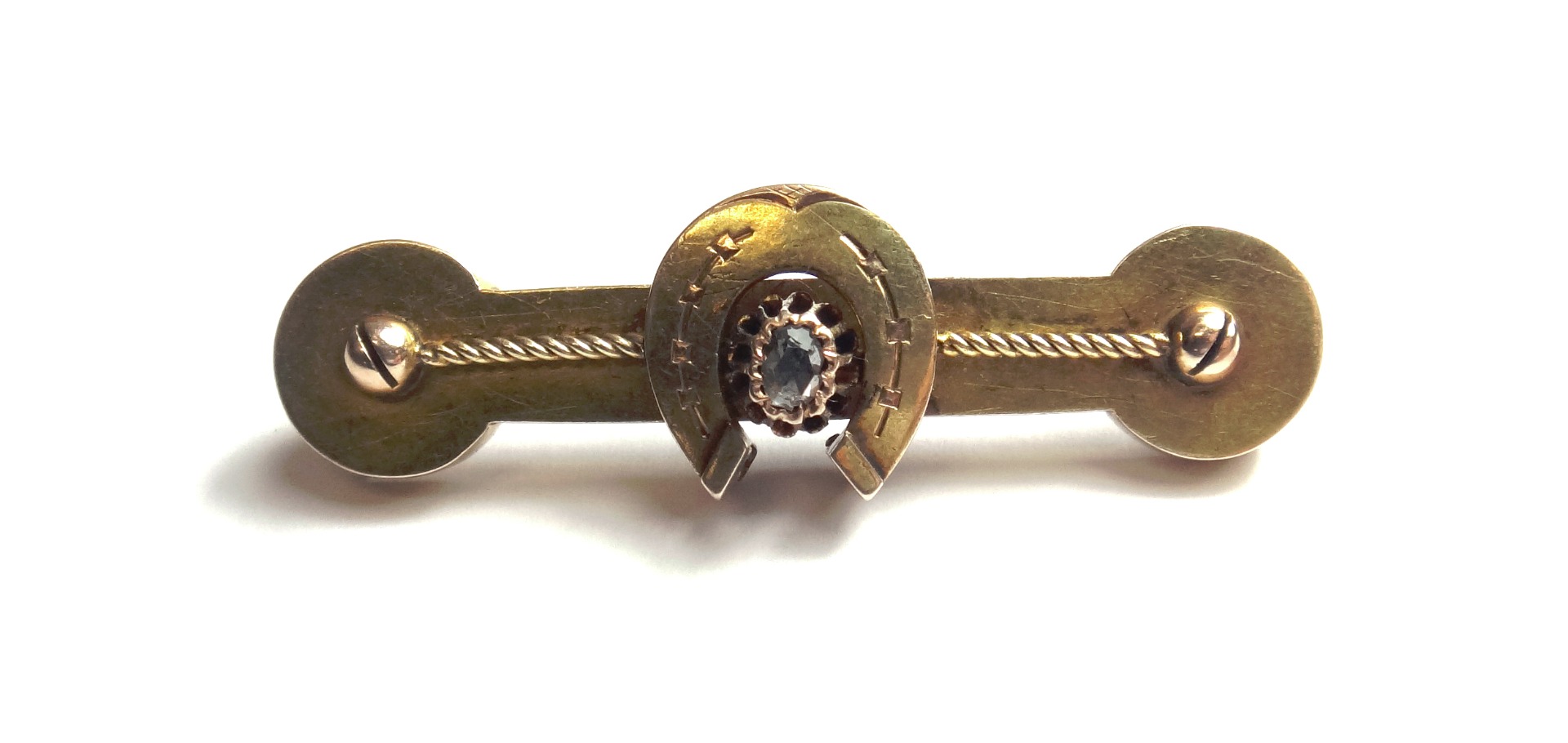 Appraisal: A gold and rose diamond set single stone brooch designed