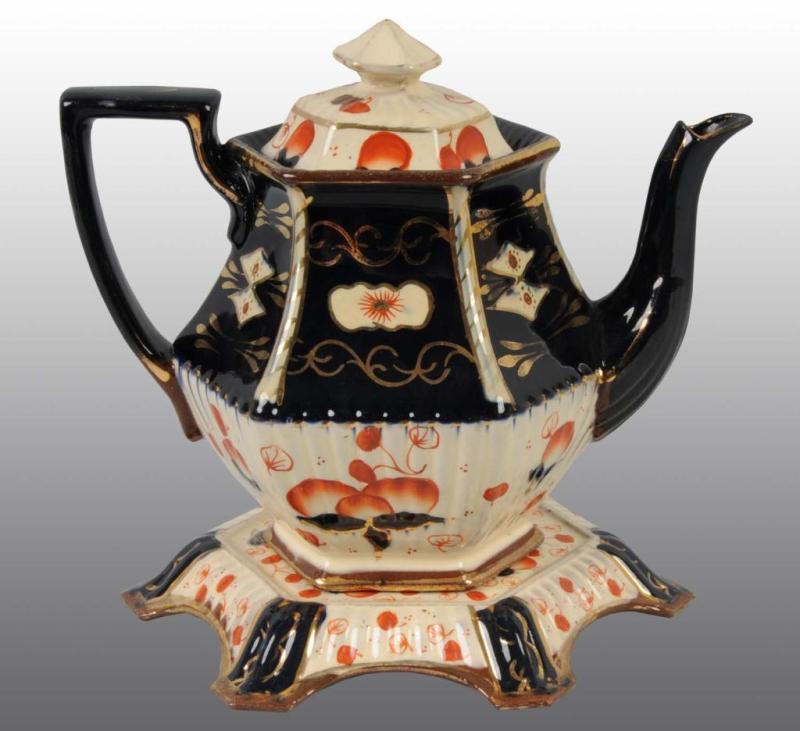 Appraisal: Gaudy Dutch Teapot Description Includes hotplate Original lid No damage