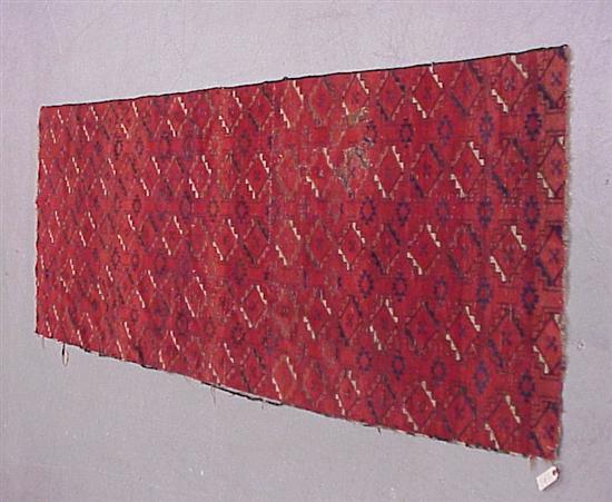 Appraisal: Antique Bokhara rug fragment red with black geometric pattern '