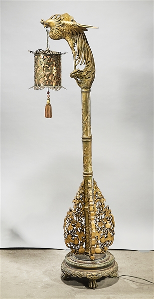 Appraisal: Tall Chinese carved gilt wood lamp stand incised metal base