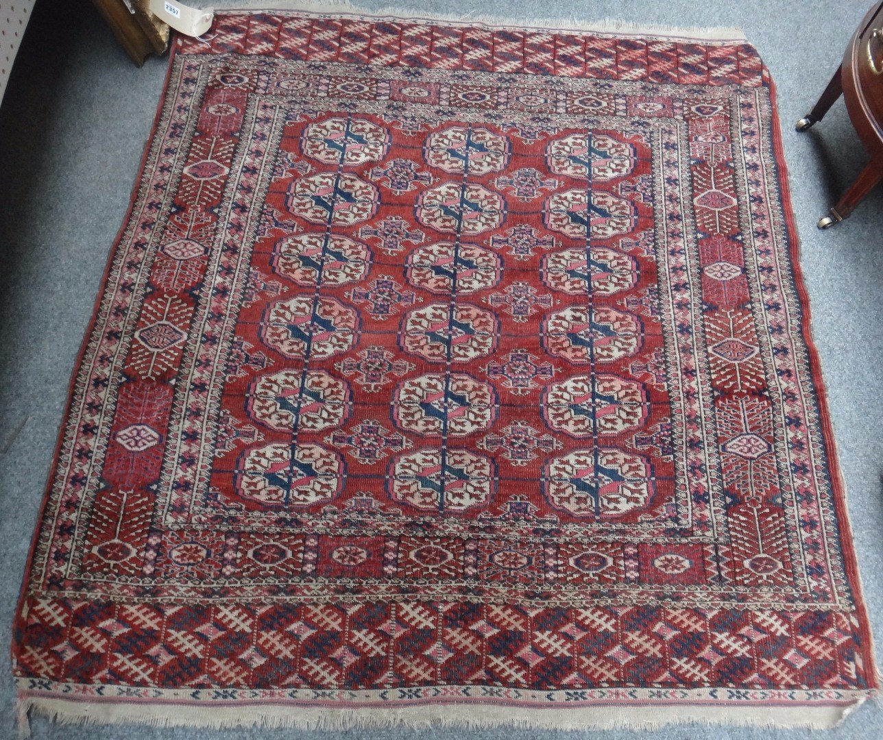 Appraisal: A Tekke Turkeman rug the madder field with three columns