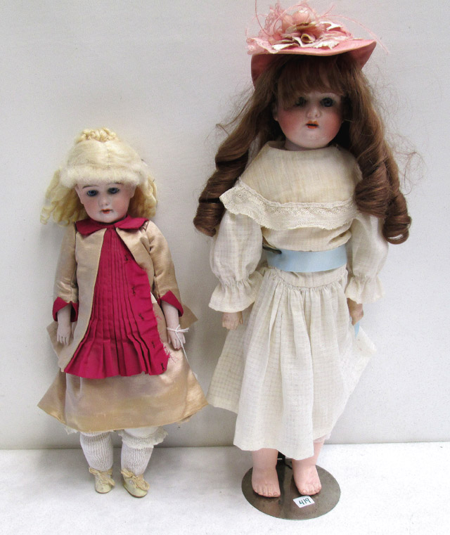 Appraisal: TWO GERMAN BISQUE GIRL DOLLS The first marked Armand Marseille