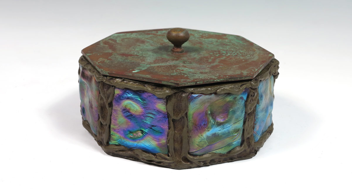 Appraisal: TIFFANY STUDIOS BRONZE AND GLASS COVERED BOX Octagonal shape set