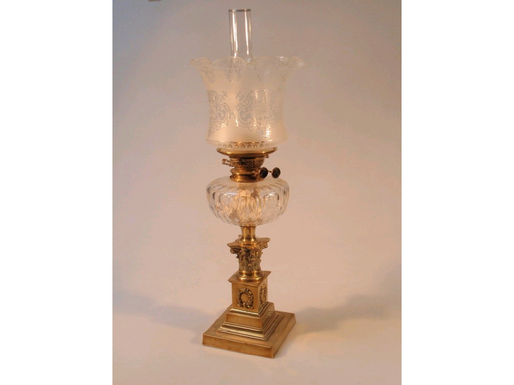 Appraisal: A Victorian brass Corinthian capitol oil lamp with faceted clear