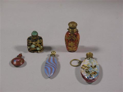 Appraisal: EMBELLISHED GLASS PERFUME BOTTLES FLASKS Including a black glass bottle