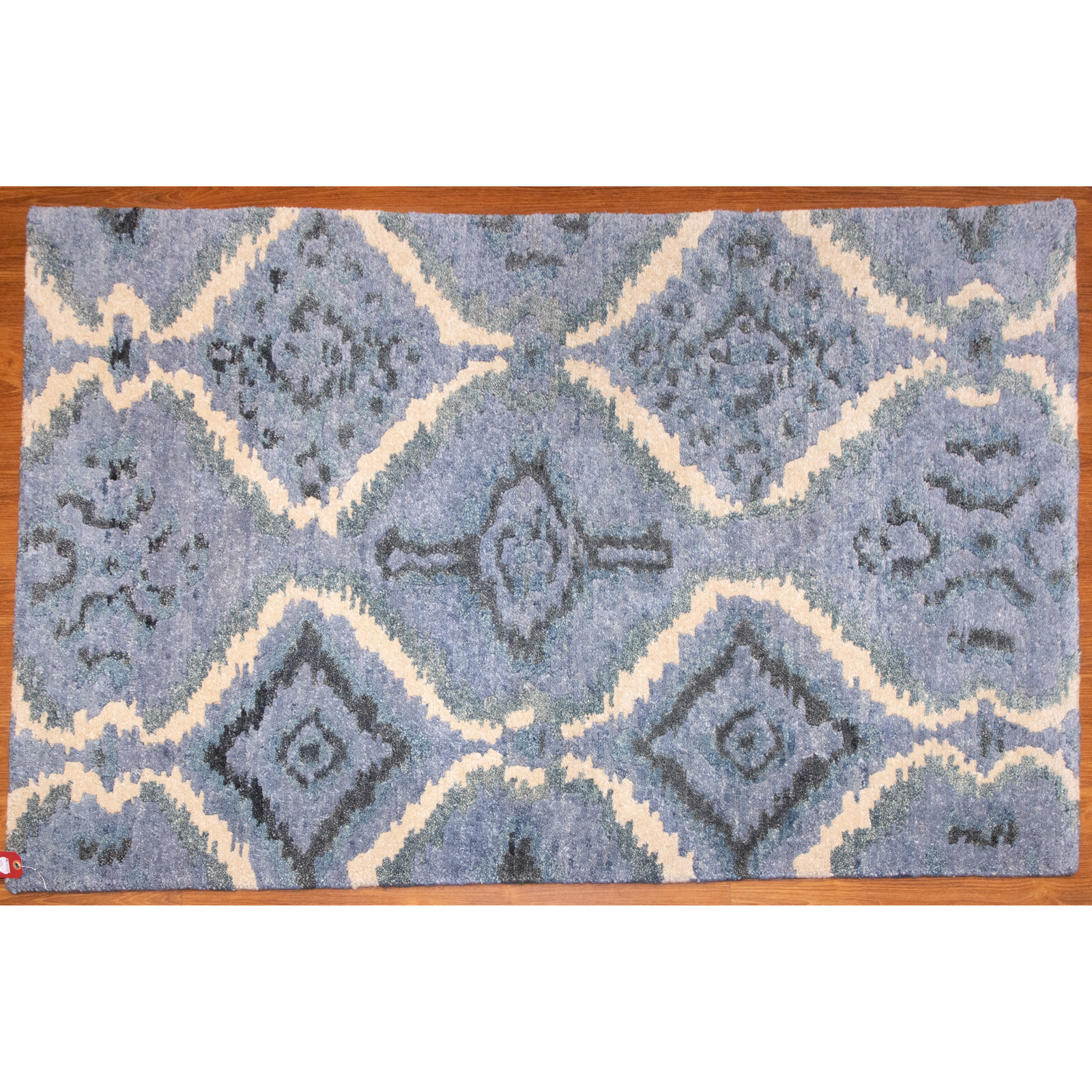 Appraisal: MODERN RUG INDIA X Modern hand-knotted wool pile on wool