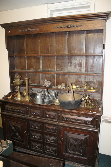 Appraisal: AN ANTIQUE OAK DRESSER with raised back the front having