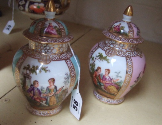 Appraisal: A pair of Dresden porcelain covered small baluster vases decorated