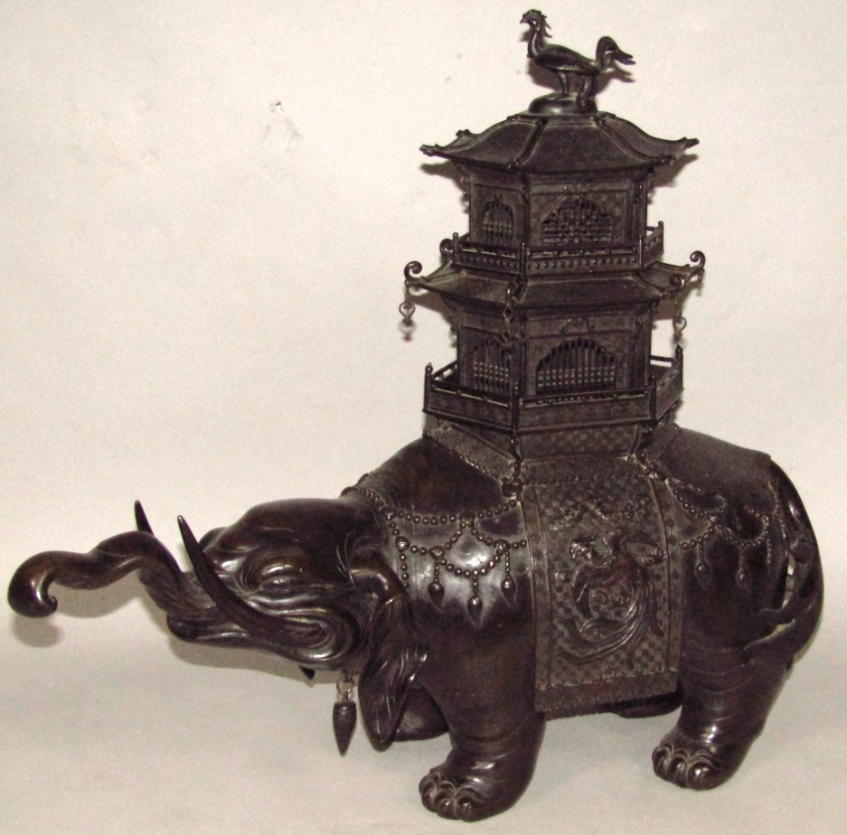 Appraisal: A Japanese Meiji period bronze figure of a standing elephant