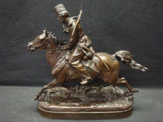 Appraisal: LANCERAY E A Bronze of a Russian Cossack Charging Signed