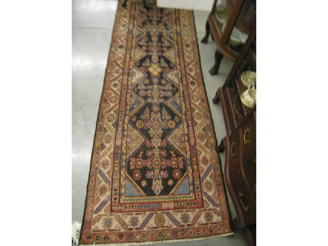 Appraisal: Malayer Persian Handmade Runner geometrics earthtones surrounding an indigio field