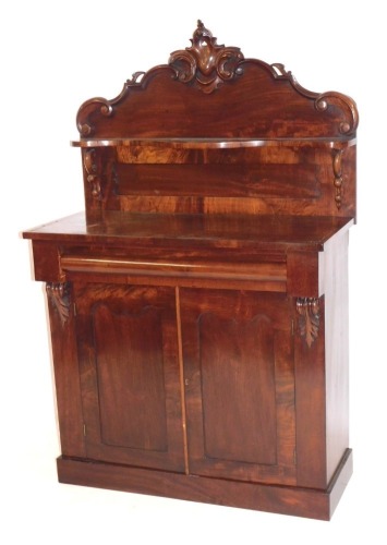 Appraisal: A Victorian mahogany chiffonier carved shaped back with a single