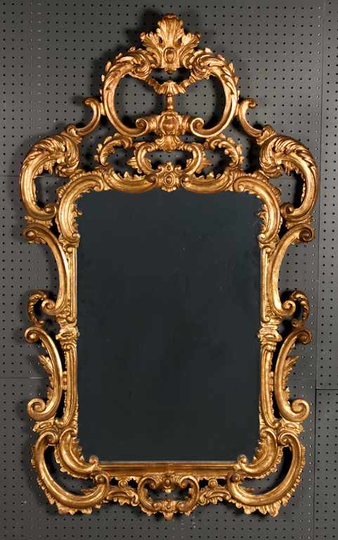 Appraisal: Italian rococo style giltwood mirror elaborately carved acanthus and scroll