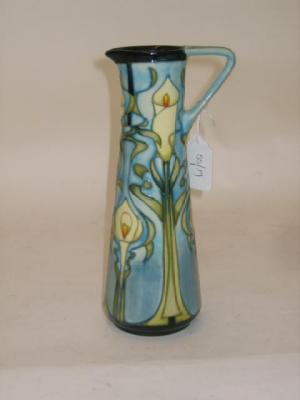 Appraisal: A MOORCROFT POTTERY EWER dated of tapering form tube lined