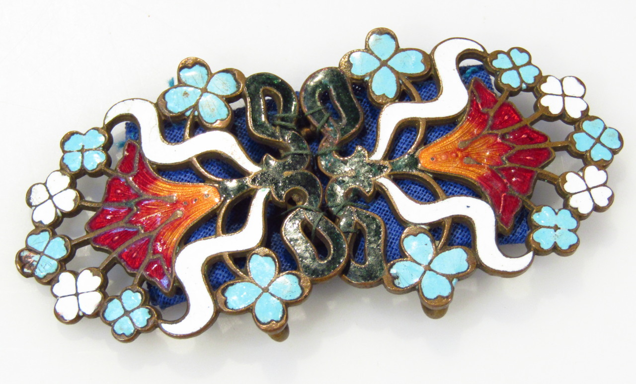 Appraisal: An Edwardian Art Nouveau double enamel buckle decorated with flowers