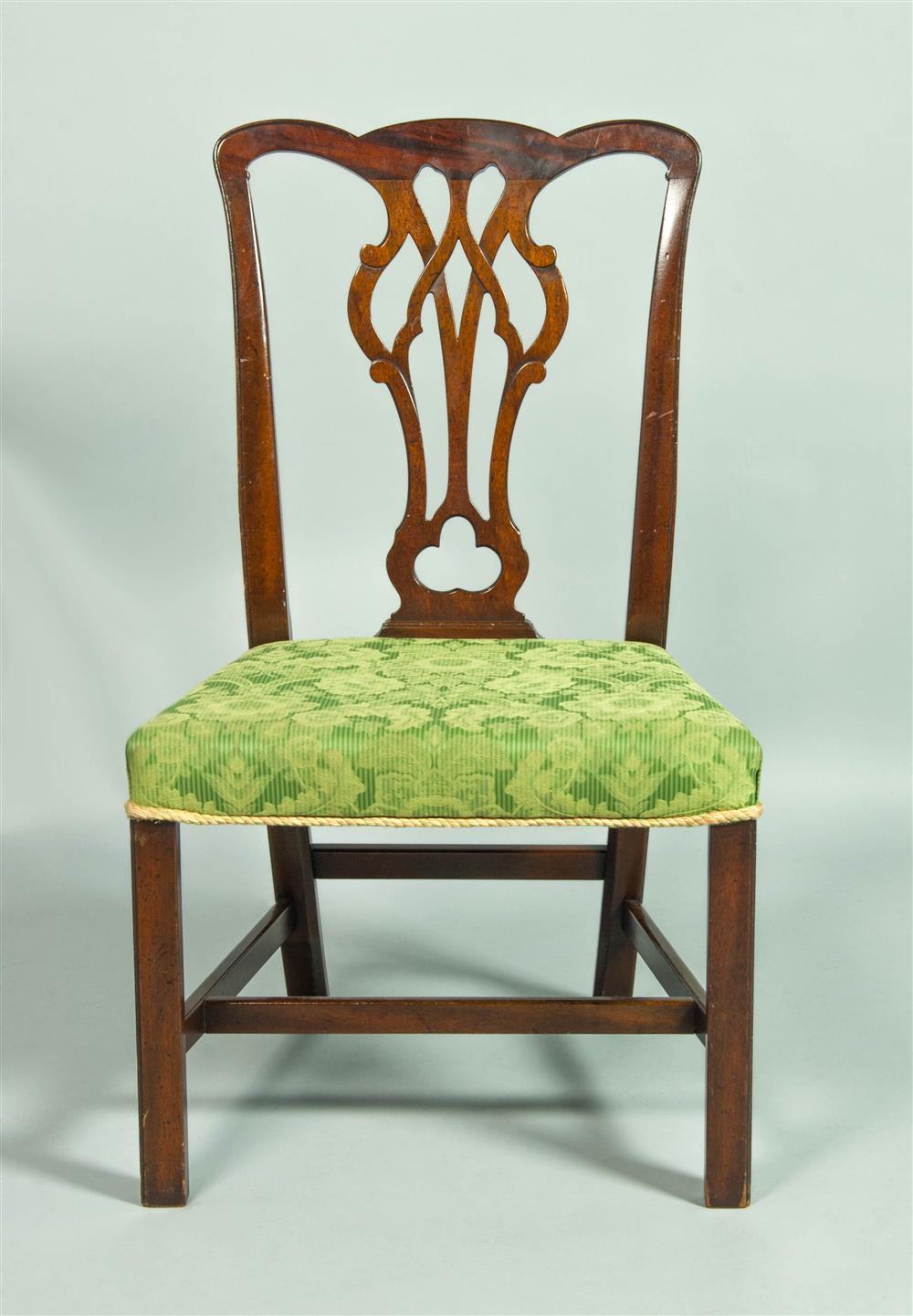 Appraisal: GEORGE III STYLE MAHOGANY SIDE CHAIR with shaped crest over