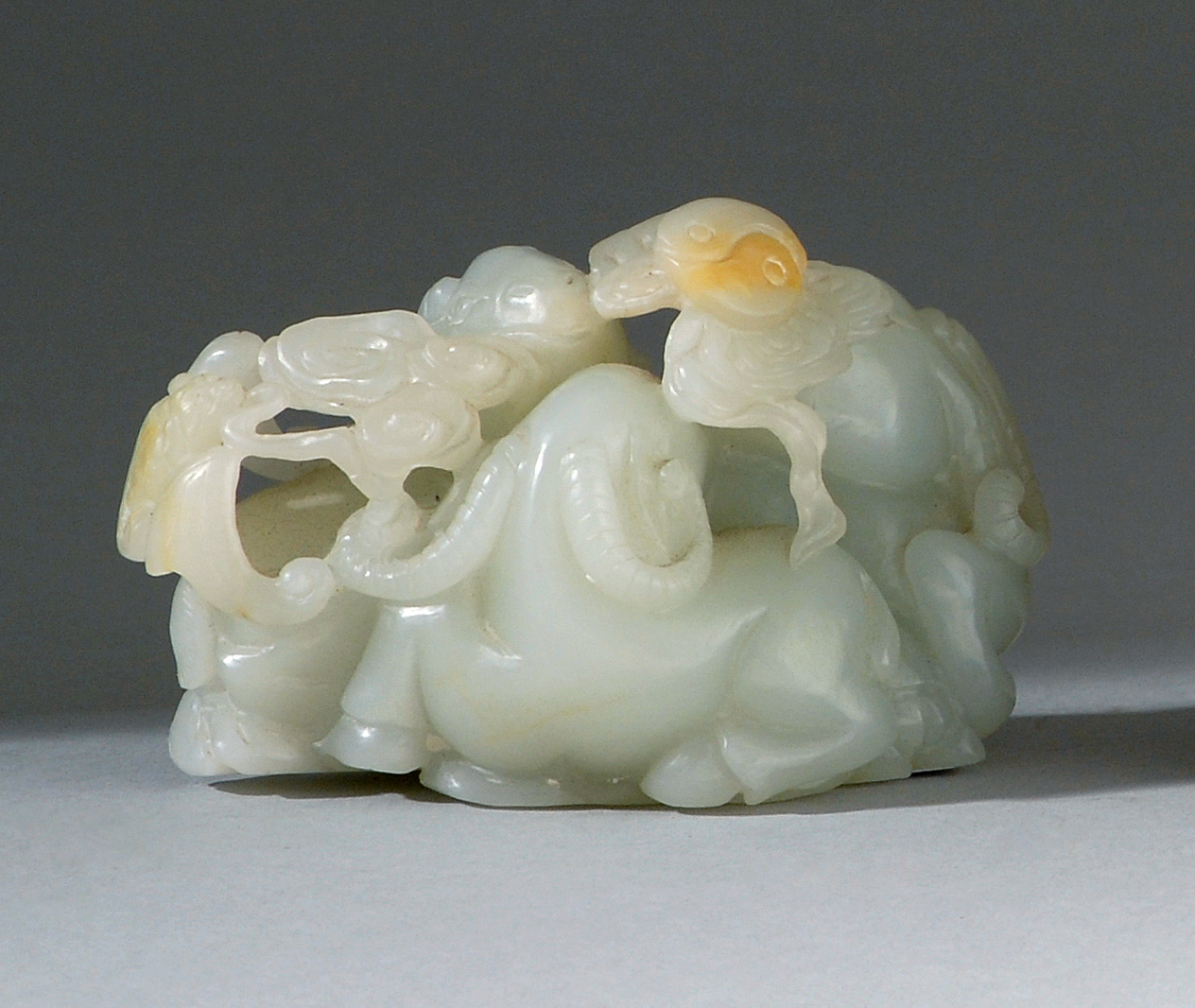 Appraisal: WHITE JADE CARVING th th CenturyIn the form of three