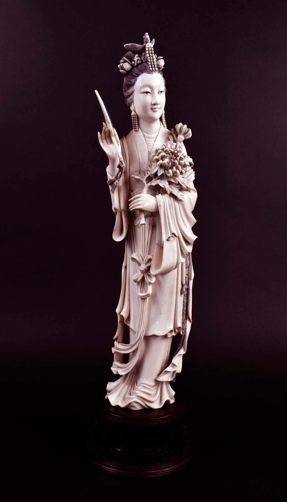 Appraisal: FINE CHINESE CARVED FIGURE OF A MERINThe elegant lady with