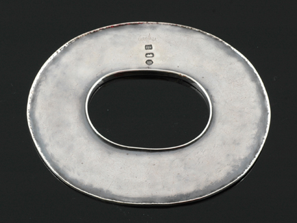 Appraisal: A handcrafted silver oval bangle by Roy Lewis The elongated