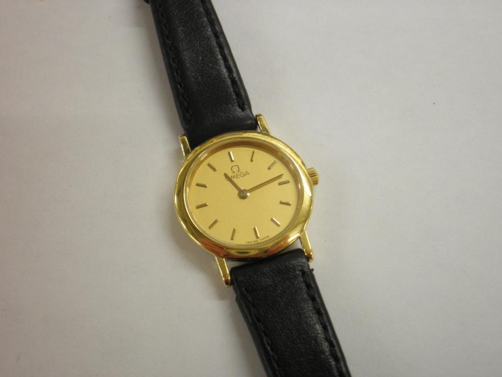 Appraisal: A ladies Omega de Ville gold plated wrist watch on