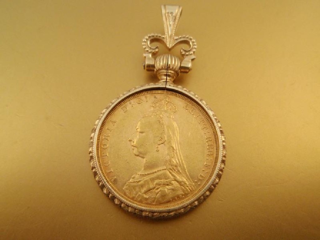 Appraisal: A ct gold fob enclosing an Jubilee head sovereign