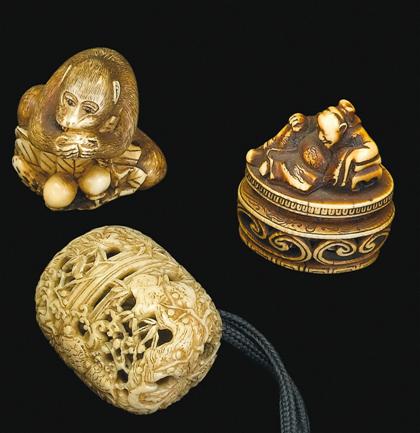 Appraisal: Two Japanese elephant ivory models and a staghorn model th