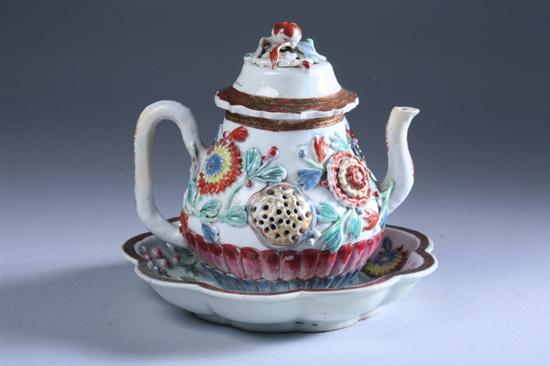 Appraisal: CHINESE FAMILLE ROSE PORCELAIN LOTUS TEA POT AND STAND Yongzheng