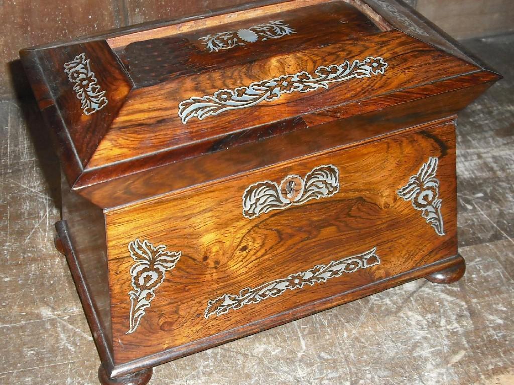 Appraisal: Victorian rosewood tea caddy of sarcophagus form with a fitted