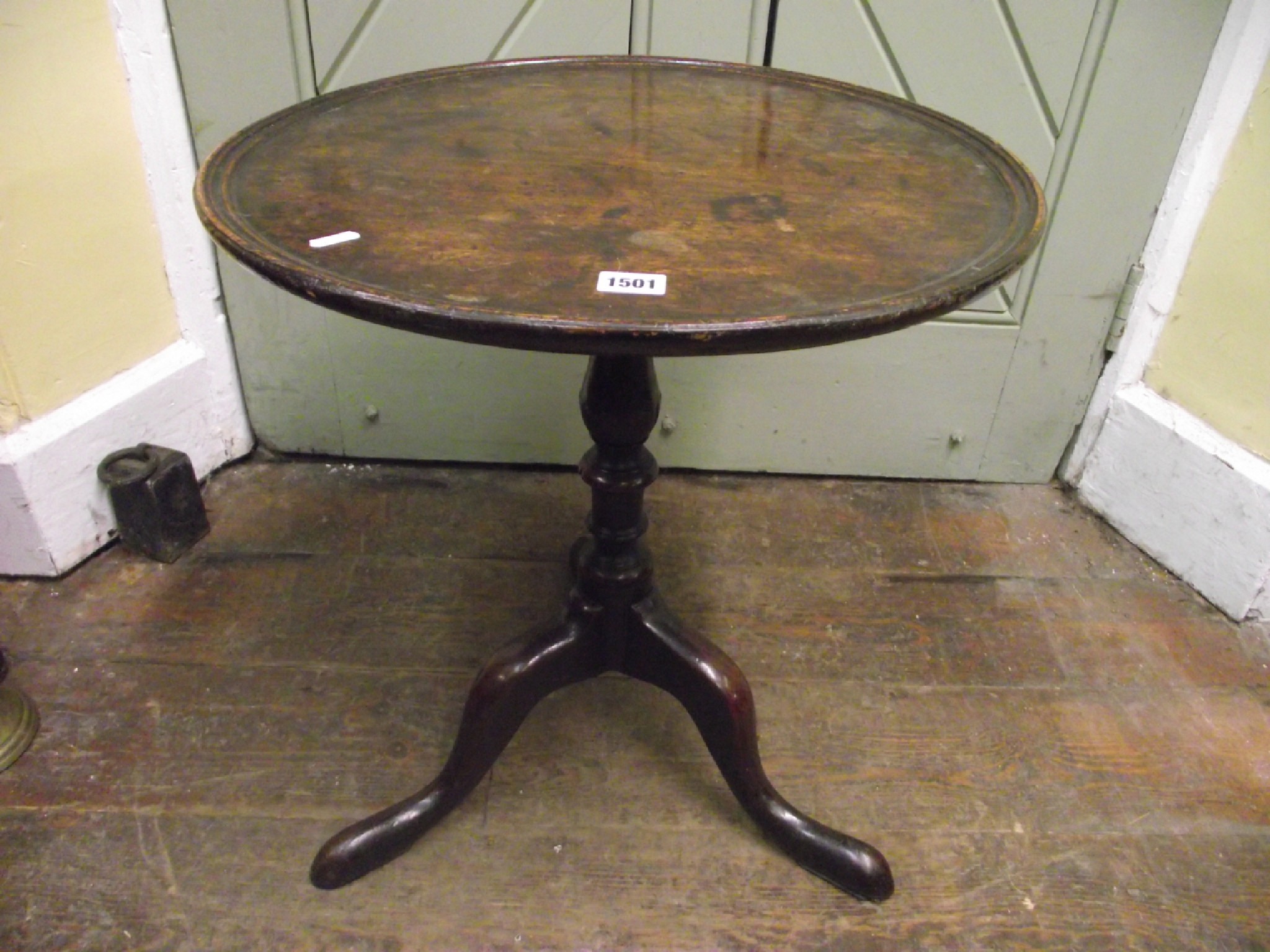 Appraisal: A Georgian mahogany occasional table the circular dished top raised