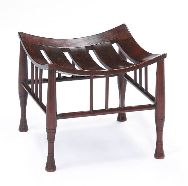 Appraisal: An English mahogany Thebes stoolearly th century With slatted concave