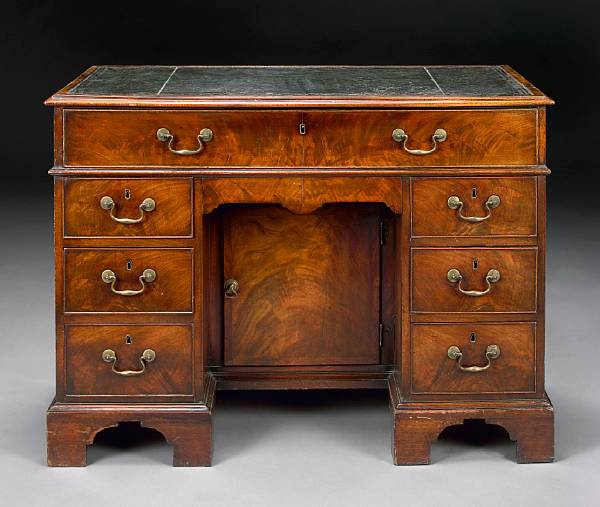 Appraisal: A George III mahogany kneehole desk second half th century