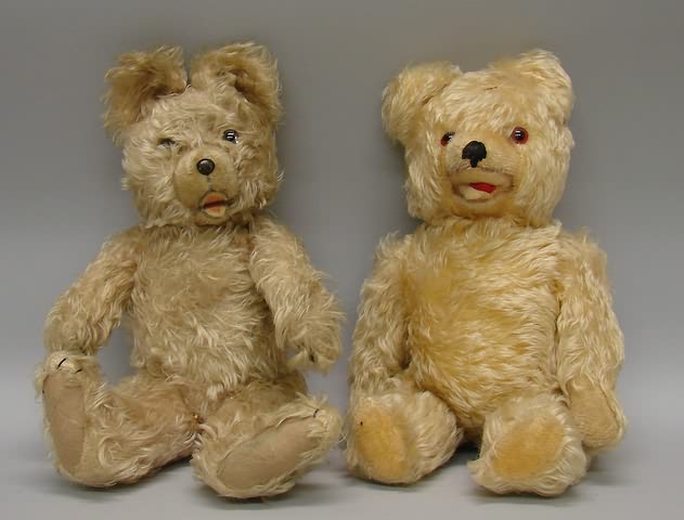 Appraisal: Pair of long mohair bears with open mouths Apricot with