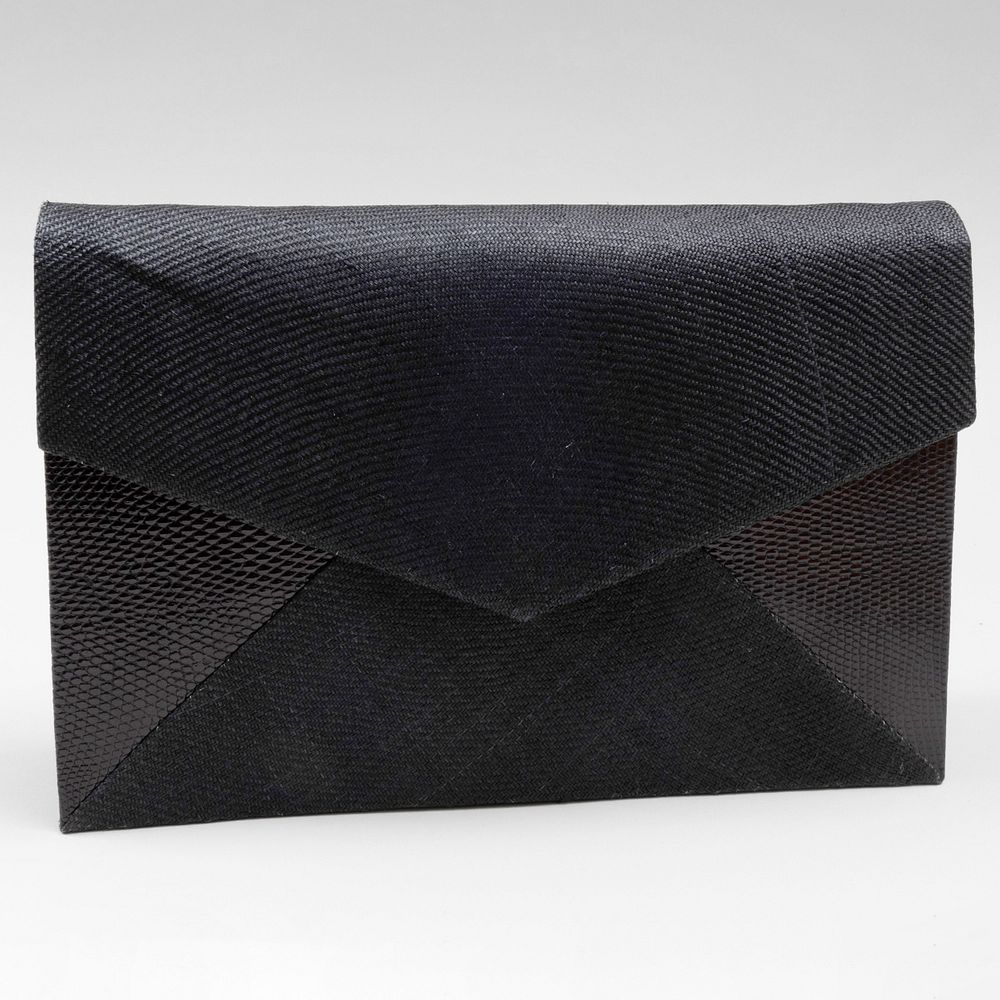 Appraisal: Ren Mancini Woven and Textured Leather Clutch With label x