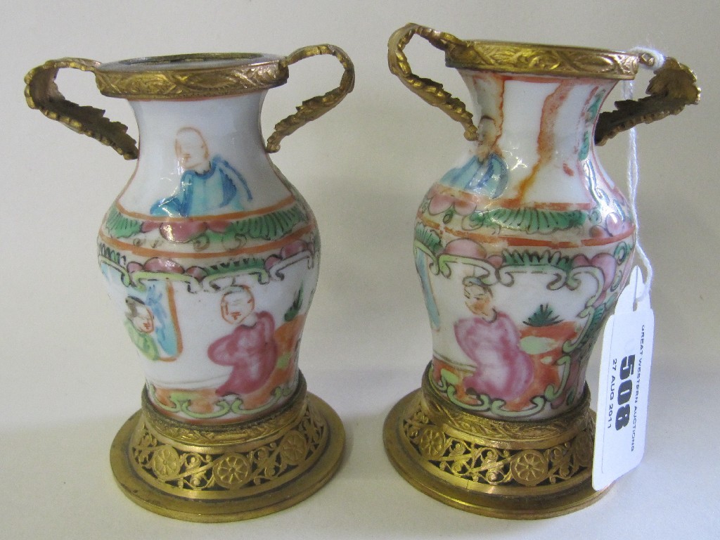 Appraisal: Pair of gilt metal mounted Chinese vases