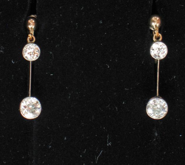 Appraisal: A PAIR OF DIAMOND DROP EARRINGS each ct yellow gold