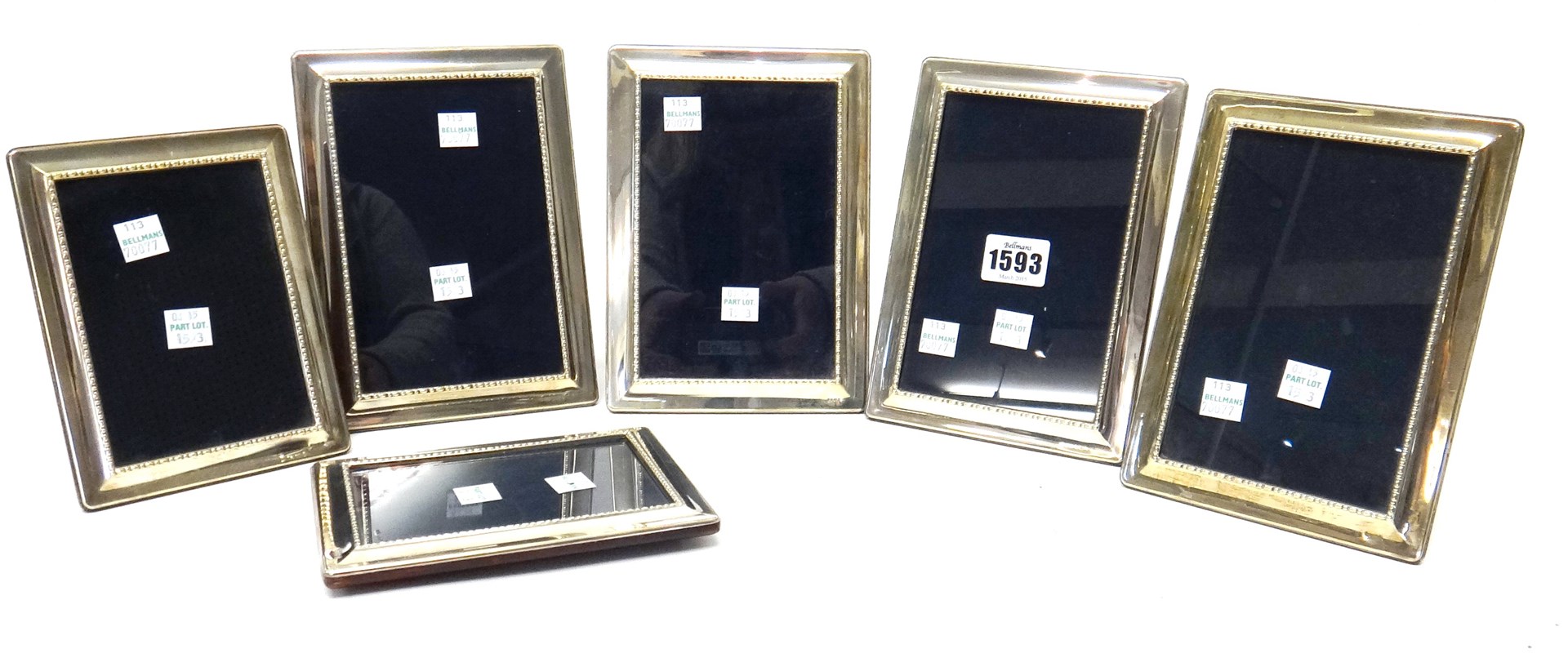 Appraisal: Six similar silver mounted rectangular photograph frames with decorated inner