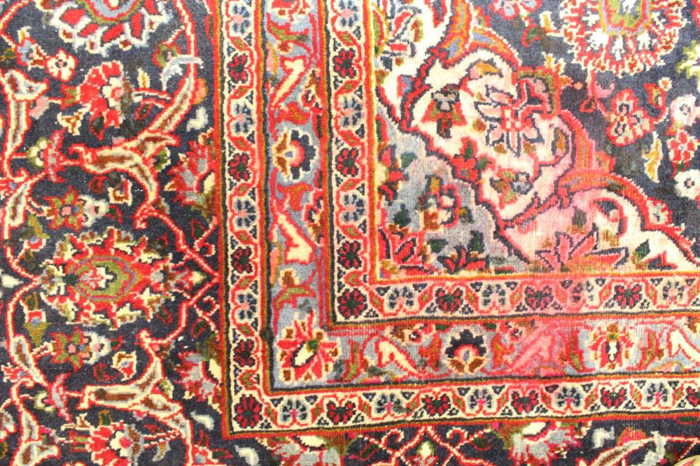 Appraisal: HAND KNOTTED PERSIAN CARPET floral and central floral medallion design