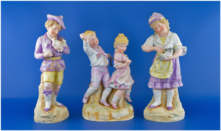 Appraisal: Three Heubach Bisque Figure Groups Girl And Boy Both With