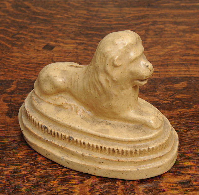 Appraisal: AN EARLY TH CENTURY CREAM WARE POTTERY MONEY BOX in