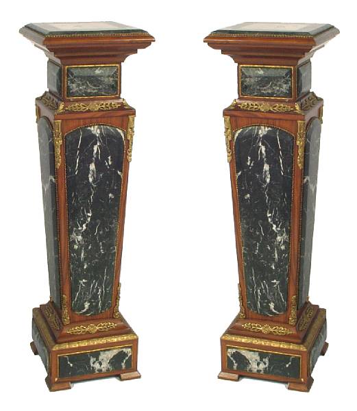 Appraisal: A pair of Neoclassical style bronze mounted and marble inlaid