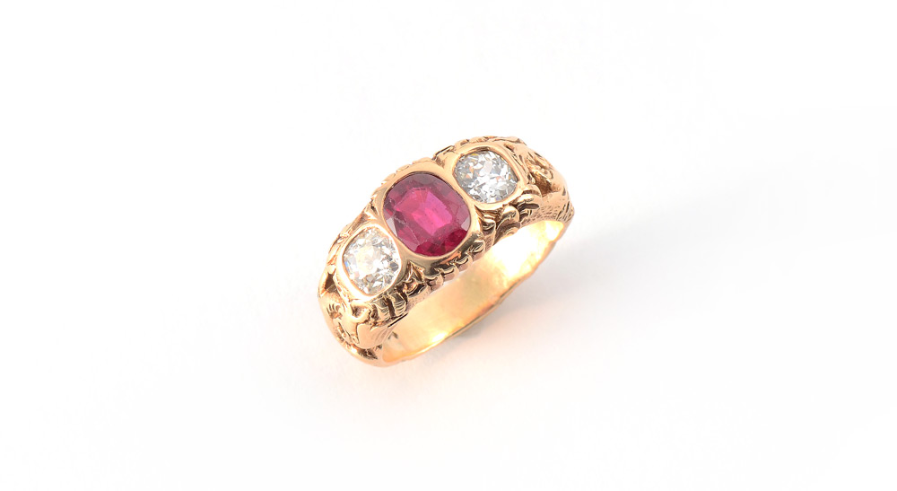 Appraisal: EDWARDIAN LADIES OR MEN'S RUBY AND DIAMOND RING Double dragon