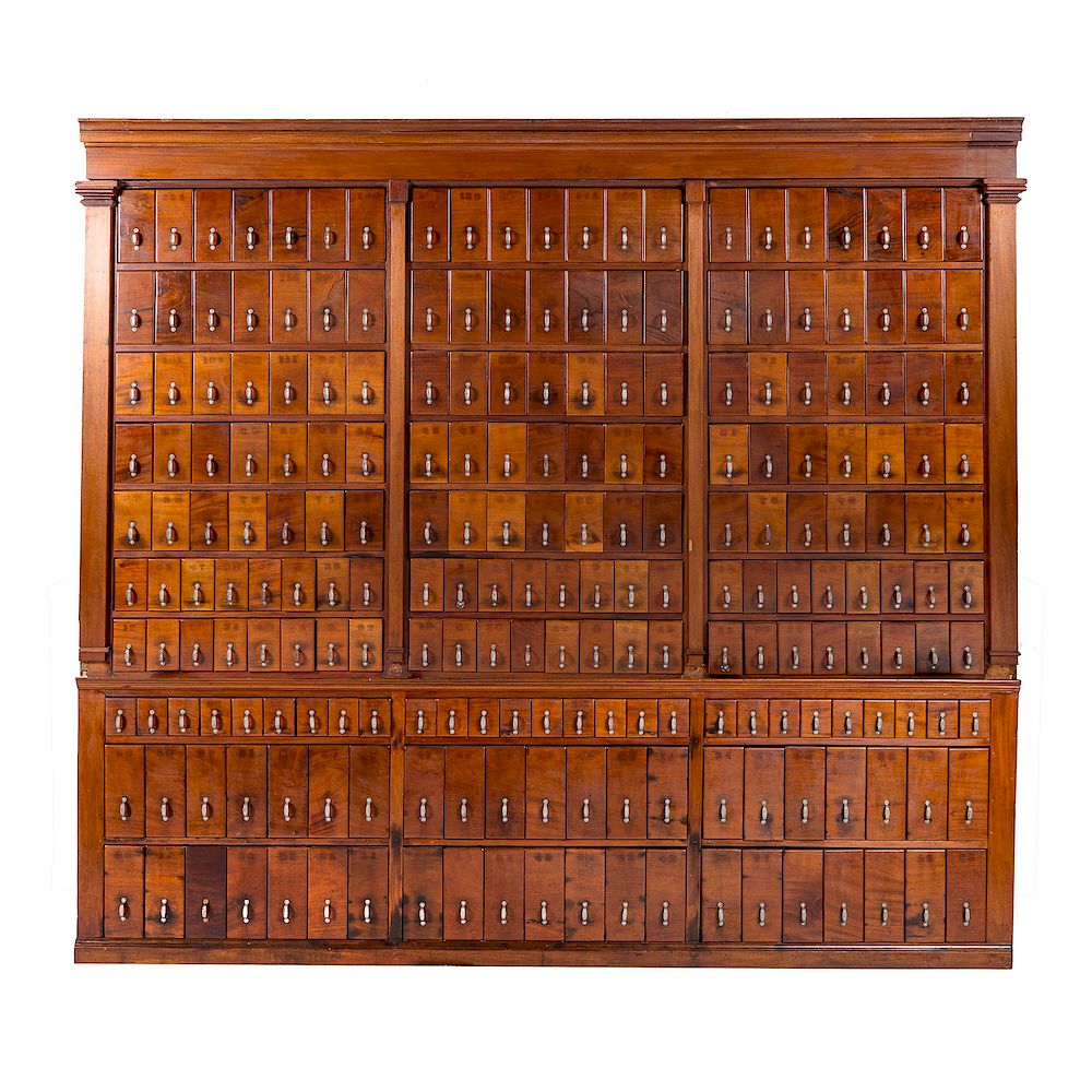 Appraisal: Large American walnut apothecary cabinet late th century upper having