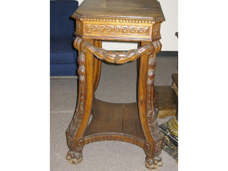 Appraisal: MASSIVE OAK PEDESTAL Rectangular top with canted corners and gadrooned