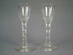 Appraisal: Pair of late th century facet stemmed wine glasses the