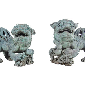 Appraisal: A Pair of Patinated Bronze Buddhistic Lions Second Half th