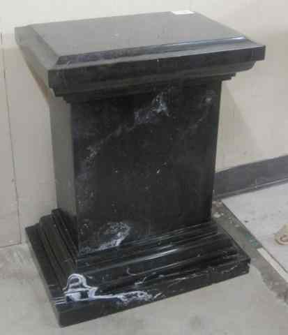 Appraisal: A BLACK MARQUINA MARBLE PEDESTAL of overall rectangular form ''H