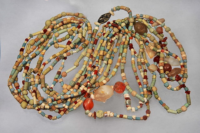 Appraisal: FIVE AGATE AND CLAY BEAD NECKLACES some with carved beads