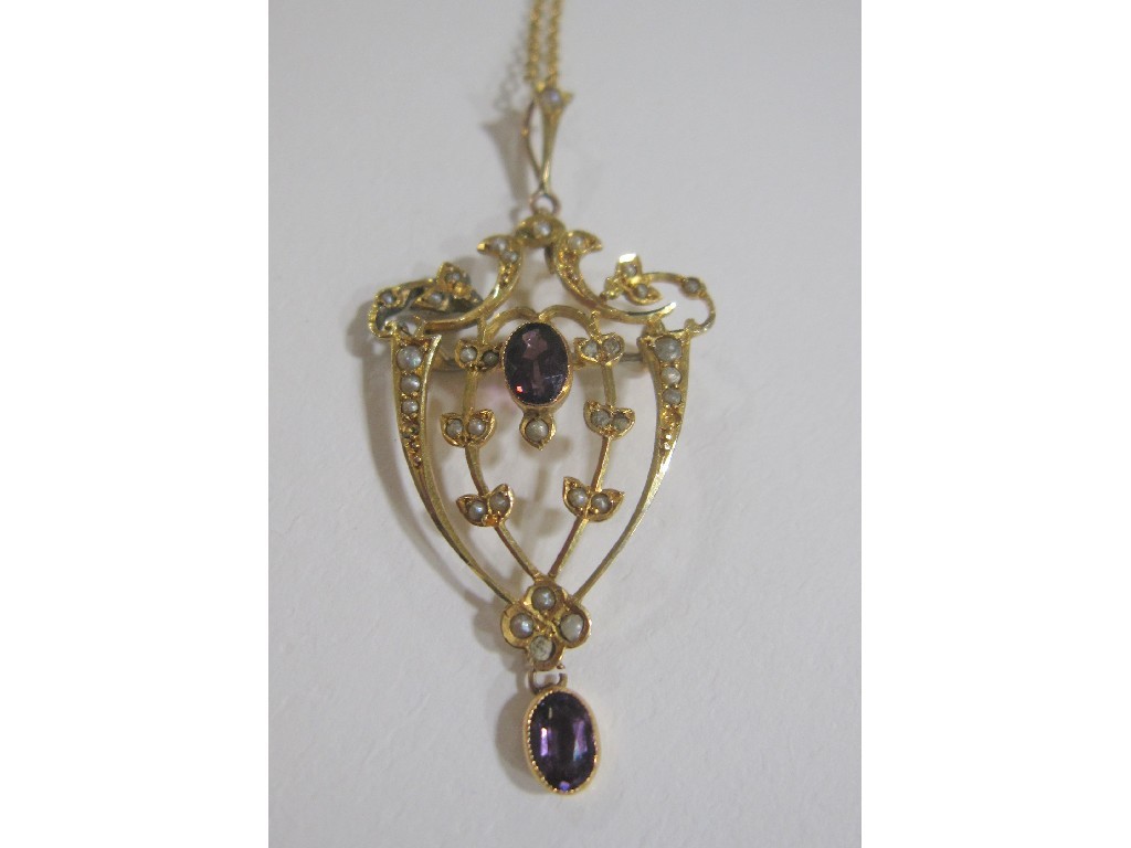 Appraisal: Nine carat gold holbien pendant set with amethyst and seed